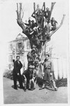 Members of the Maccabi boy scouts pose in the branches of a tree in Salonika.