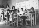 Julie Hermanova, a Czech Jewish nursery teacher, teaches a class in the Vence children's home.