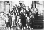 Group portrait of Jewish DP youth on the steps of the La Borie children's home.