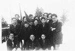 Group portrait of Jewish DP youth from the Poulouzat children's home outside in the snow.