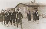 Jewish police parade through the Bergen-Belsen DP camp.