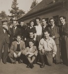 Group portrait of members of the Kibbutz Haghibor hachshara in the Bergen-Belsen DP camp.