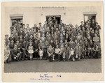 Group portrait of the staff and boys of Ambloy, an OSE home for religious youth.