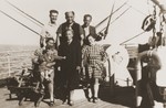 Austrian Jewish refugees pose on the deck of the SS Virgilio on their journey from Italy to Chile.