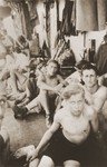 Jewish youth relax on the deck of the Mala immigrant during its voyage to the new State of Israel.