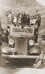 Austrian Jewish refugees pose on the back of a truck during an excursion to the Altiplano in Bolivia.