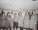 Members of a congressional group investigating German atrocities inspect the gas chamber in Dachau.