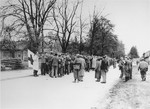 SS personnel in Dachau surrender to troops of the 45th U.S.