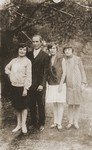Ben Dresner poses with his nieces Ange, Tola and Nacha Broda in Zawiercie.