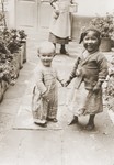 Leo Spitzer and a Bolivian child in the garden of his home in La Paz.