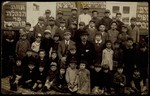 Group portrait of teachers and students in the Eisiskes Hebrew School.