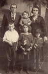 Portrait of the Raboy family in Berezno, USSR.  

Pictured are Abraham and Feiga Raboy and their four children: Buncia, Shaindel, Beila, and Aron.