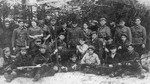 A group of partisans from various fighting units including the Bielski group and escapees from the Mir Ghetto on guard duty at an airstrip in the Naliboki Forest.