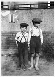 Two Jewish DP boys pose outside in the Mariendorf displaced persons camp.