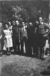 Group portrait of the staff of an OSE (Oeuvre de Secours aux Enfants) children's home in France [either in Ambloy or Taverny], where some of the Buchenwald children were cared for.
