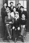 Judith Hemmendinger poses with a group of Jewish DP youth who numbered among the Buchenwald children, at an OSE (Oeuvre de Secours aux Enfants) children's home in France [either in Ambloy or Taverny].