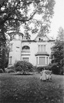 Hannah Feist poses with her children on the grounds of their estate in Bad Homburg, Germany.