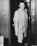 Hermann Goering enters the defendants' dock at the International Military Tribunal trial of war criminals at Nuremberg.