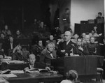 Deputy Chief Prosecutor Charles Dubost presents the French prosecution's final statement at the International Military Tribunal trial of war criminals at Nuremberg.