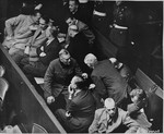 The defendants confer during a recess at the International Military Tribunal trial of war criminals at Nuremberg.