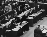 The defense counsellors hear the reading of the indictment against the defendants on the first day of the International Military Tribunal trial of war criminals at Nuremberg.