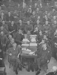 Robert Jackson and the other members of the American prosecution team follow the proceesings at the International Military Tribunal for war criminals at Nuremberg.