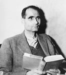Defendant Rudolf Hess reads "Jugend" by Ernest Claes in his cell at the Nuremberg prison while on trial before the International Military Tribunal.