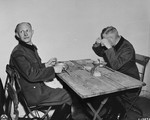 Defendants Alfred Jodl (left) and Wilhelm Keitel (right) eat in a makeshift dining room adjacent to the courtroom at the International Military Tribunal trial of war criminals at Nuremberg.