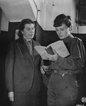 Johanna Wolf (left), Adolf Hitler's former secretary, and Ingeborg Sperr (right), Rudolf Hess's former secretary, practice their English while waiting to testify at the International Military Tribunal trial of war criminals at Nuremberg.