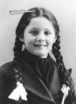 Portrait of a Jewish refugee child from Belgium taken by the Swiss police after she escaped with her family from occupied France into Switzerland in the fall of 1943.