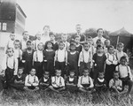 Group portrait of children and staff of the Jewish orphanage in Drohobycz.