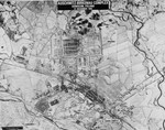 An aerial reconnaissance photograph showing  Auschwitz concentration camp, including the Auschwitz I and Auschwitz II camps and the surrounding area.