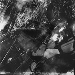 An aerial reconnaissance photograph showing Auschwitz III (Monowitz) and a part of the IG Farben "Buna" complex.