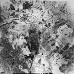 An reconnaissance aerial photograph of Auschwitz including Birkenau and Auschwitz III (Monowitz) next to the I.G.