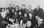Jewish survivors froem Skierniewice at a social gathering in Lodz.