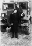 Shie Zoltak poses with his cousin, Chana Lisogurski, next to an UNRRA truck in the Cremona DP camp.