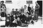 Isaak Libstug visits with the teachers and children in the Foehrenwald orphanage.