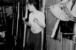 Paul Yarin of Boston stands in the flooded engine room of the President Warfield after the gale that nearly sank the ship during its first attempt to cross the Atlantic Ocean.