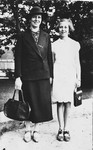 A Jewish mother and daughter pose in a park in Stettin shortly before the daughter departs on a Kindertransport to Belgium.