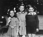 Judith Koeppel poses with her adopted sister (the daughter of her rescuer) and another child after the war.