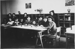 Children write their lessons in the study room of a Jewish children's home in Antwerp.