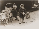Two year old twins Ellinor (now Eleanor Gerson) and Evelyn Perl (now Evelyn Pearl) at home in Berlin shortly before the family fled Germany.