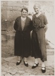 Two Jewish women pose outside in Wollstein, Germany.