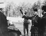 Karl-Gustav Sauberzweig, the German Waffen SS officer who commanded the 13th SS Division ("Handschar"), salutes Hajj Amin al-Husayni during his visit to Bosnia.