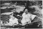 Two young sisters share a hammock.

Pictured are Sophie and Luba Libo.