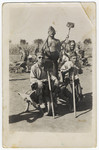 Four Hungarian Jewish men pose with shovels in a Hungarian labor battalion.