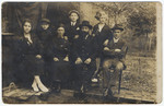 Prewar portrait of the Freedman family.

From left to right are a married sister, Yitzchak, the mother Hennia, Albert, the father Yona, a sister and the older sister's husbnd.