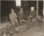 The mayors of three nearby towns are forced to see the corpses of prisoners burned alive by the SS in a barn outside Gardelegen.
