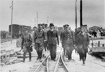 Reichsfuehrer SS Heinrich Himmler tours the Monowitz-Buna building site in the company of SS officers and IG Farben engineers.