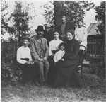 Portrait of the Mikolaevsky family at their dacha in the village of Strelna, a suburb of St.